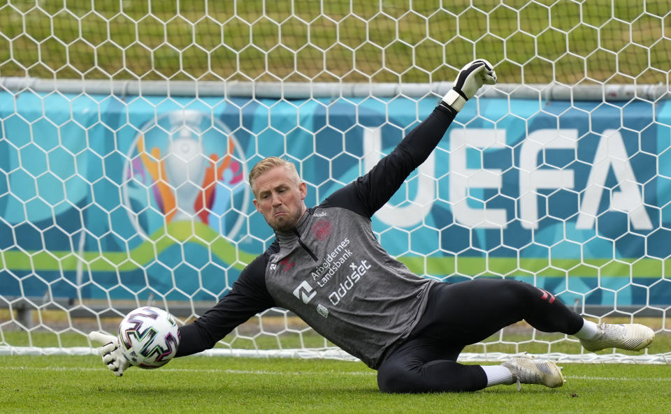 Denmark's goalkeeper Kasper Schmeichel exercises at the training ground during a training session of Denmark's national team in Helsingor, Denmark, Monday, June 14, 2021. It is the first training of the Danish team since the Euro championship soccer match against Finland when Christian Eriksen collapsed last Saturday. (AP Photo/Martin Meissner)