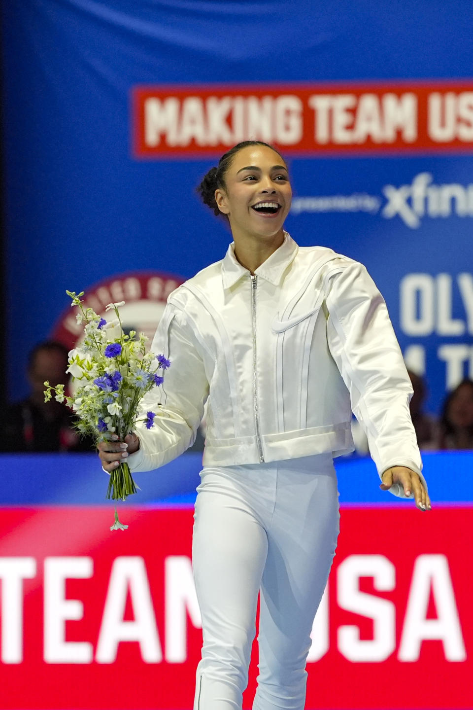 Hezly Rivera smiles as she is named to the 2024 Olympics team at the United States Gymnastics Olympic Trials on Sunday, June 30, 2024, in Minneapolis. (AP Photo/Abbie Parr)