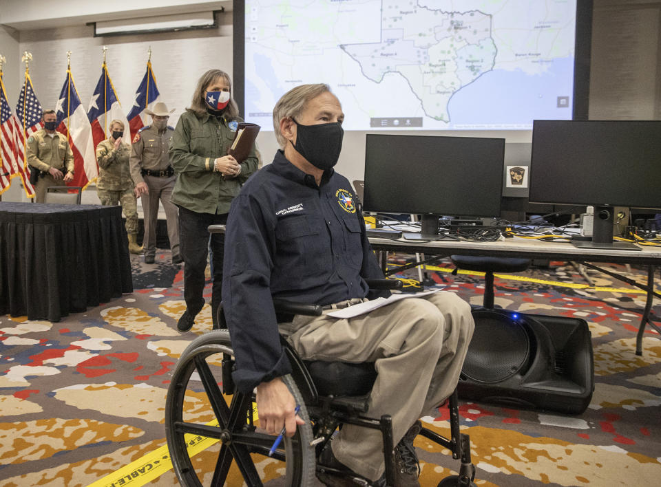 Texas Gov. Greg Abbott leaves a news conference after speaking about the winter storm at the State Operations Center, Thursday Feb. 18, 2021, in Austin, Texas. ( Jay Janner/Austin American-Statesman via AP)