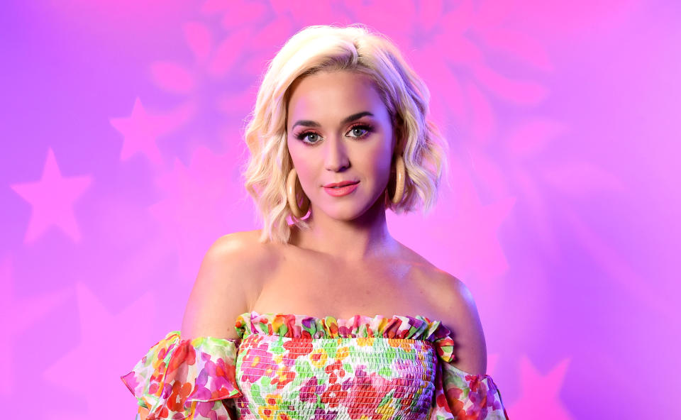 Katy Perry in pink lighting. (Michael Kovac / Getty Images for SiriusXM)