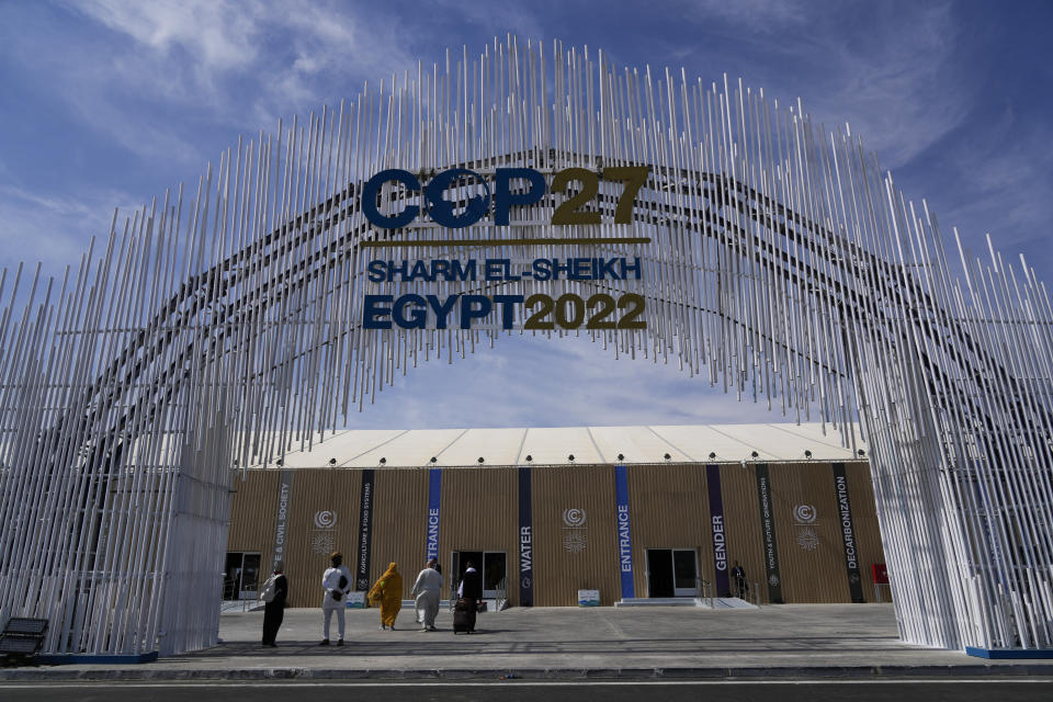 Guests enter the convention center hosting the COP27 U.N. Climate Summit, Friday, Nov. 4, 2022, prior to the start of the summit on Nov. 6, which is scheduled to end on Nov. 18, in Sharm el-Sheikh, Egypt. (Peter Dejong/AP Photo)