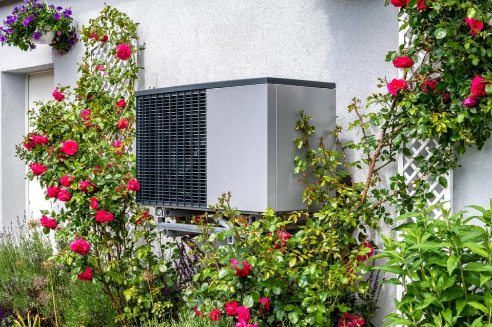 Heat pumps can both warm and cool a building (Getty Images/iStockphoto)