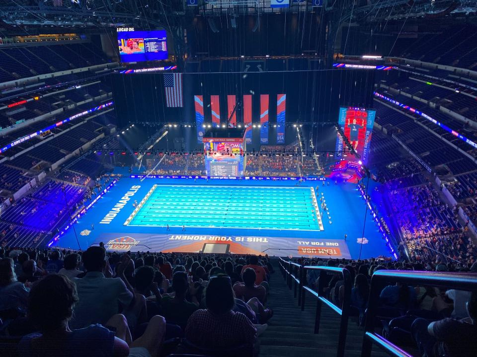 The view from the upper deck made the swimmers look like tiny specs. (Henry Bushnell/Yahoo Sports)