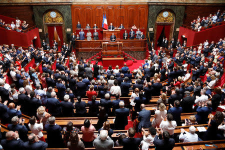 Members of both houses applaud as French President Emmanuel Macron delivers a speech during a special congress gathering both the upper and lower houses of the French parliament (National Assembly and Senate) in Versailles near Paris, France, July 9, 2018. REUTERS/Charles Platiau