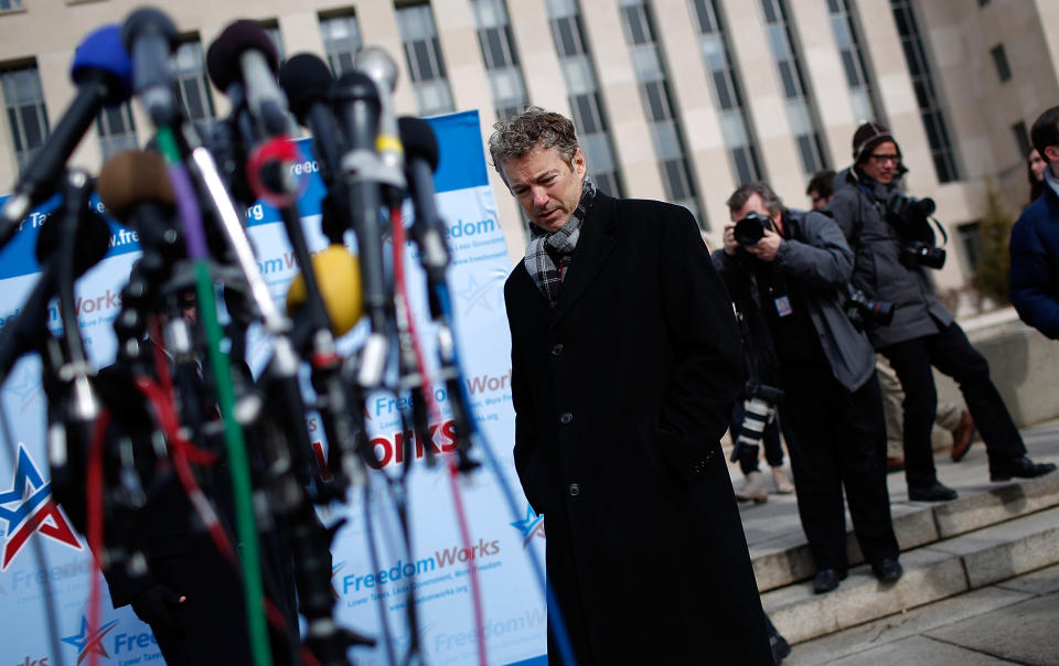 WASHINGTON, DC - FEBRUARY 12:  U.S. Sen. Rand Paul (R-KY) arrives in front of U.S. District Court to announce the filing of a class action lawsuit against the administration of U.S. President Barack Obama, Director of National Intelligence James Clapper, National Security Agency Director Keith Alexander and FBI Director James Comey. Paul said he filed the lawsuit to stop NSA surveillance of U.S. phone records because Obama has Òpublicly refused to stop a clear and continuing violation of the 4th amendment.Ó  (Photo by Win McNamee/Getty Images)