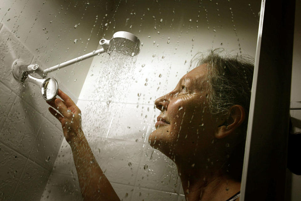 A family could save £120 by cutting a minute off a shower. (Getty Images)