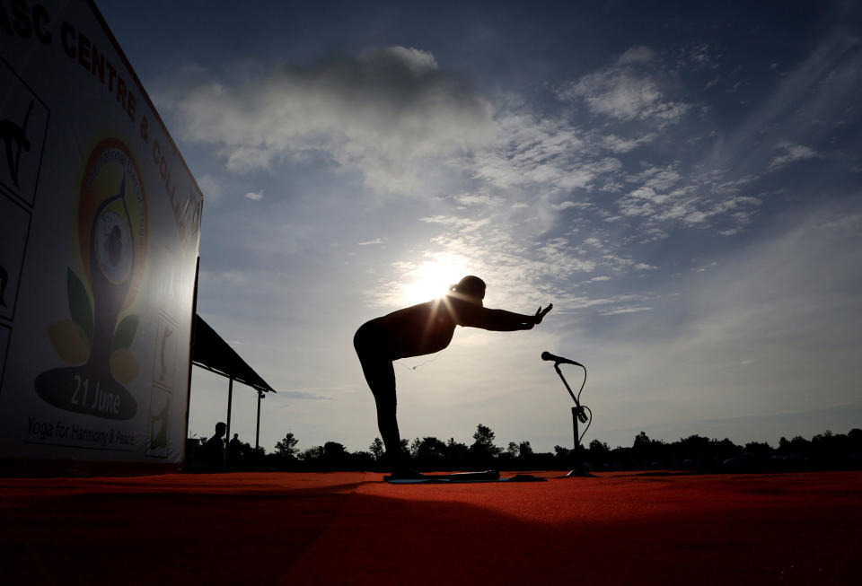 <p>An Indian yoga instructor leads a large group of Indian army soldiers at a yoga session to mark International Yoga Day in Bangalore, India, Wednesday, June 21, 2017. (Photo: Aijaz Rahi/AP) </p>