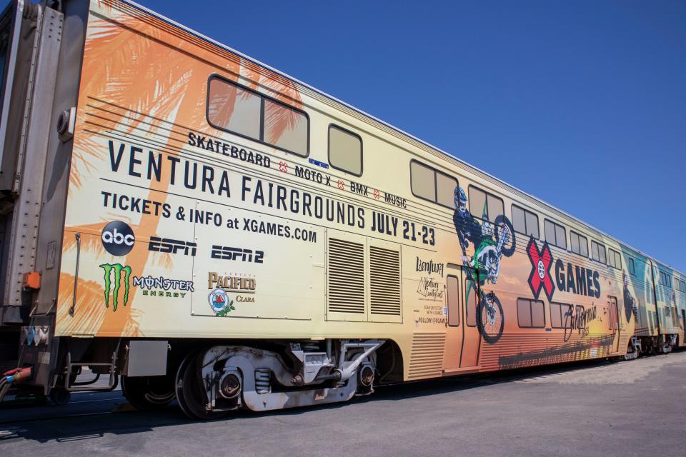 Amtrak's Pacific Surfliner has unveiled specially decorated cars for the X Games finals. The line will also expand its service for the event.
