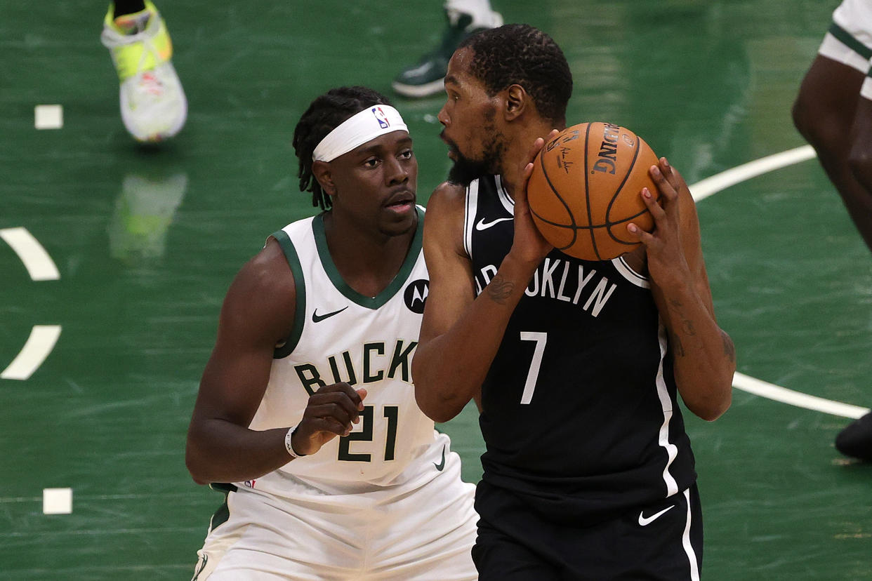 Jrue Holiday and the Bucks will try to take advantage of a depleted Nets team, led by Kevin Durant. (Photo by Stacy Revere/Getty Images)