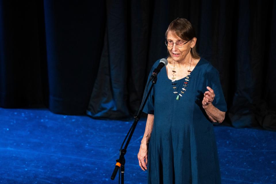 Monica Leo tells a story during the Des Moines Storytellers Project's "Travel" show at Hoyt Sherman Place on Tuesday, June 20, 2023, in Des Moines.