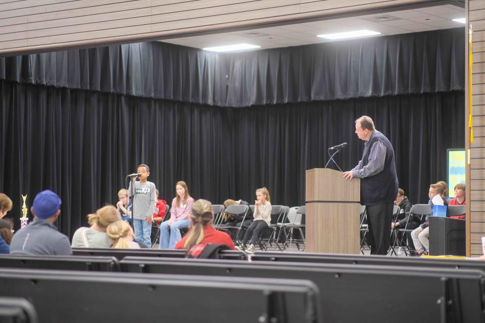 A student awaits a word to spell at the Randall County Junior Spelling Bee at Heritage Hills Elementary in Amarillo.