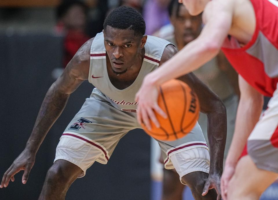 University of Indianapolis Greyhounds guard Jesse Bingham (3) watches the ball Tuesday, Feb.16, 2023 at Nicoson Hall in Indianapolis. University of Indianapolis Greyhounds defeated the Drury Panthers, 76-65. 