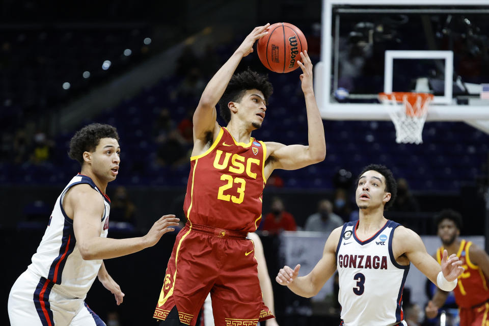 INDIANAPOLIS, INDIANA - MARCH 30: Max Agbonkpolo #23 of the USC Trojans handles the ball during the second half against the Gonzaga Bulldogs in the Elite Eight round game of the 2021 NCAA Men's Basketball Tournament at Lucas Oil Stadium on March 30, 2021 in Indianapolis, Indiana. (Photo by Tim Nwachukwu/Getty Images)