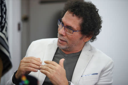 Pastor Alape, a member of the Revolutionary Armed Forces of Colombia (FARC), gestures during a news conference in Bogota, Colombia November 25, 2016. REUTERS/Jaime Saldarriaga