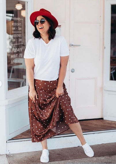 Rachael wears a mum version of polka dot midi skirt 