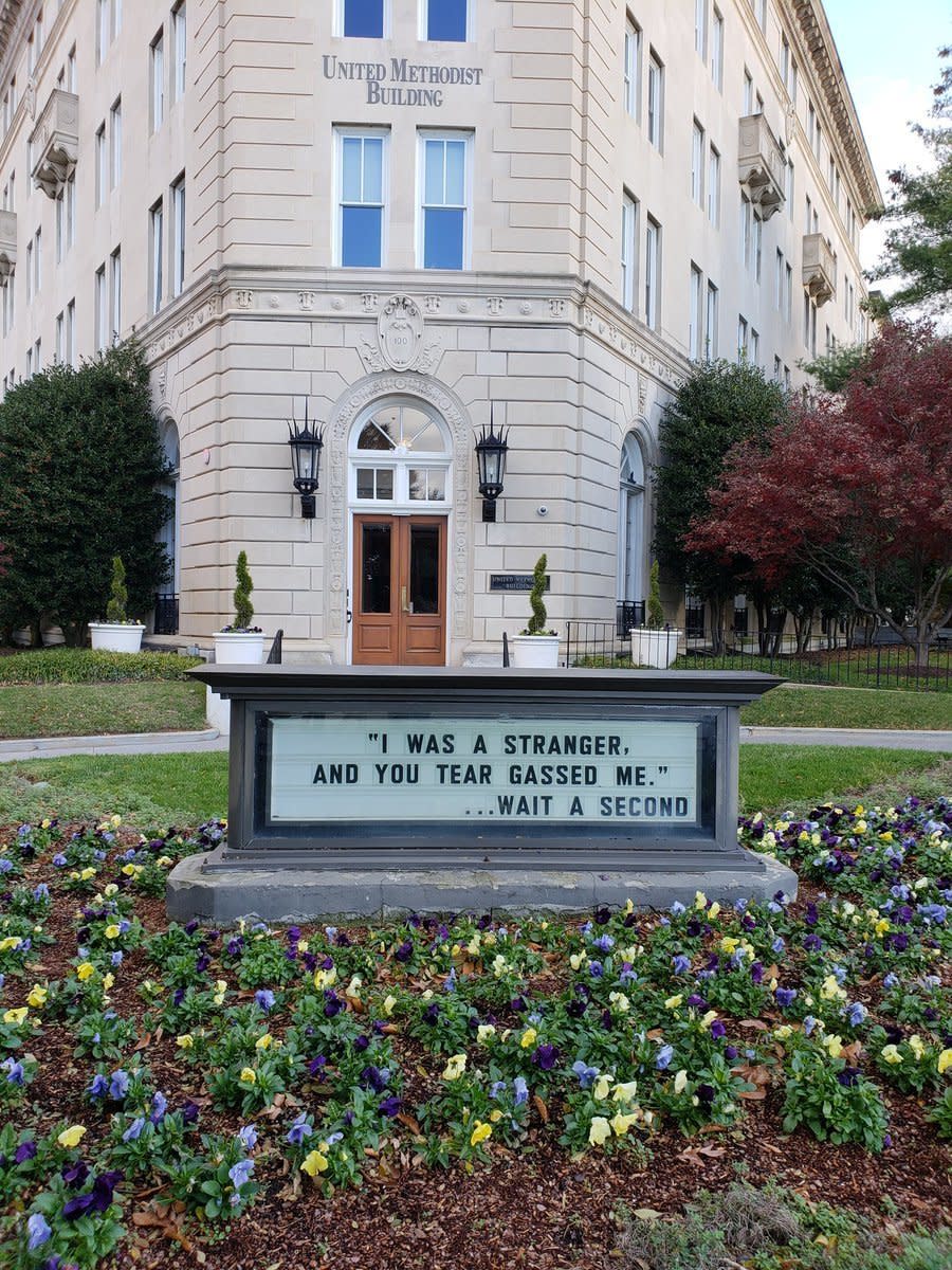 A sign outside the United Methodist Building criticizes federal agents' decision to use tear gas on immigrants, including children, at the U.S.-Mexico border. (Photo: Twitter / @umcjustice)