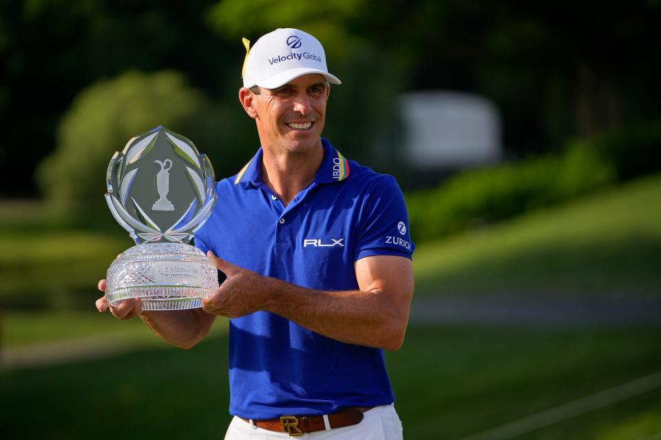 Billy Horschel stands with the trophy following his win at the Memorial Tournament on June 5.