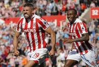 Britain Football Soccer - Stoke City v Liverpool - Premier League - bet365 Stadium - 8/4/17 Stoke City's Jonathan Walters celebrates scoring their first goal with Saido Berahino Reuters / Darren Staples Livepic