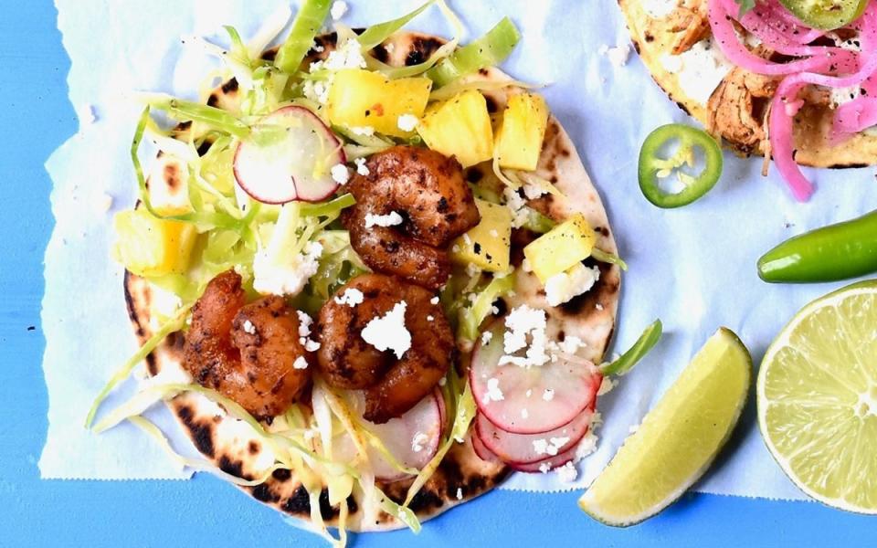 <p>Teresa Blackburn</p><p>When Taco Tuesday calls for something light and simple.</p><p><strong>Get the recipe: <a href="https://parade.com/1377269/parade/seared-shrimp-tacos-with-pineapple-slaw/" rel="nofollow noopener" target="_blank" data-ylk="slk:Seared Shrimp Tacos with Pineapple Slaw;elm:context_link;itc:0;sec:content-canvas" class="link ">Seared Shrimp Tacos with Pineapple Slaw</a></strong></p>