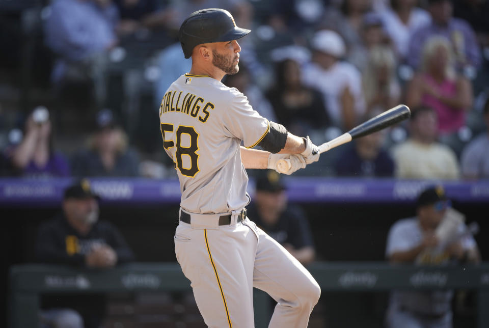 Pittsburgh Pirates' Jacob Stallings singles off Colorado Rockies relief pitcher Daniel Bard in the ninth inning of a baseball game Monday, June 28, 2021, in Denver. (AP Photo/David Zalubowski)