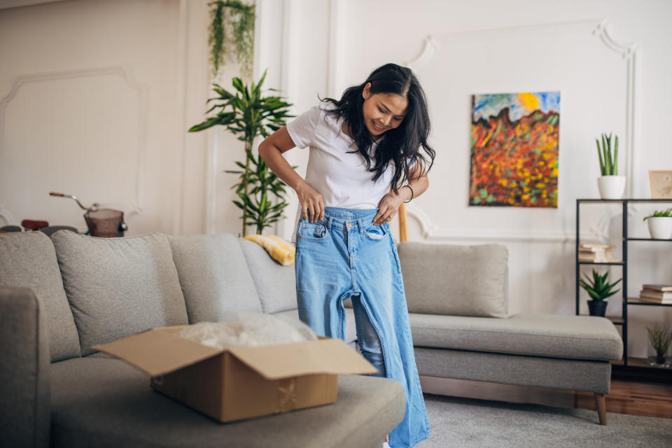 Woman with jeans over her legs