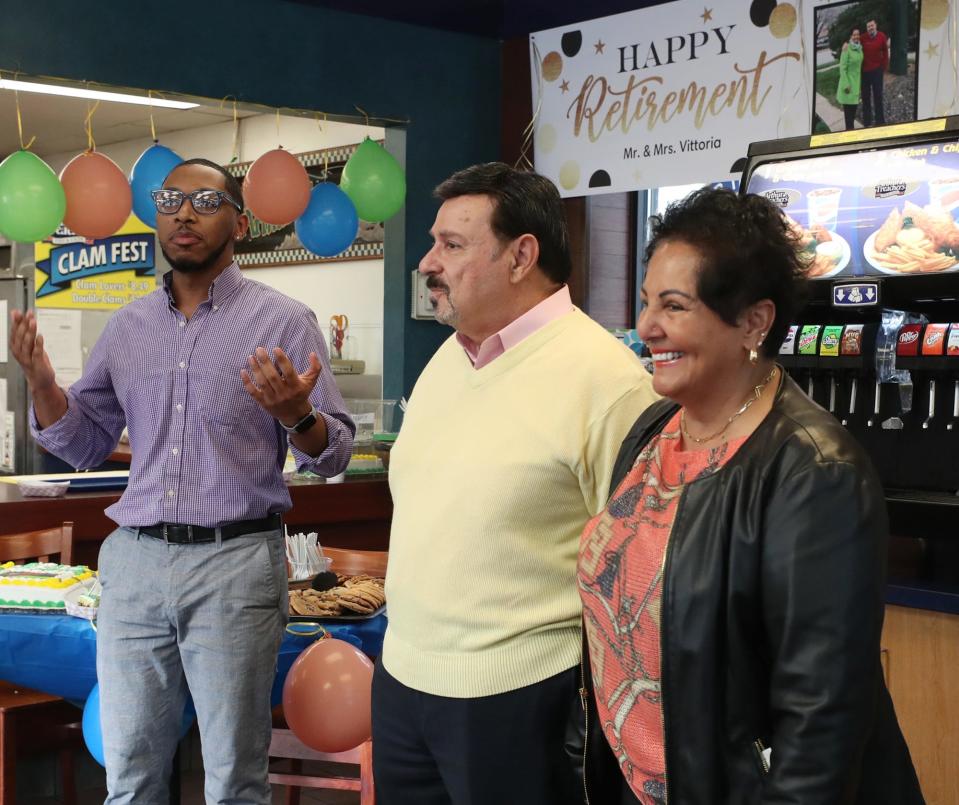 Christian Burden, general manager at Arthur Treacher's, talks about Ben Vittoria and his wife, Maridsa, at Vittoria's retirement party on Friday, April 19, 2024, in Cuyahoga Falls. Vittoria is retiring from Arthur Treacher's after working for the company for 47 years.