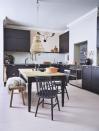 <p>This <a href="https://www.housebeautiful.com/uk/decorate/kitchen/g423/best-kitchen-design-trends/" rel="nofollow noopener" target="_blank" data-ylk="slk:kitchen;elm:context_link;itc:0;sec:content-canvas" class="link ">kitchen</a> uses a clever colour palette technique to brighten an otherwise dark design scheme. Here, the laminate flooring has pinkish undertones that are picked up and reflected in the black cabinets. This technique doesn't require high gloss surfaces to work, just make sure to pick flat panel cabinetry with a subtle sheen.</p><p><strong>Pictured: <a href="https://www.carpetright.co.uk/laminate/sensation-candy-cane-4754-painted-oak-rose-laminate/" rel="nofollow noopener" target="_blank" data-ylk="slk:House Beautiful Sensation Candy Cane Painted Laminate at Carpetright;elm:context_link;itc:0;sec:content-canvas" class="link ">House Beautiful Sensation Candy Cane Painted Laminate at Carpetright</a></strong></p>