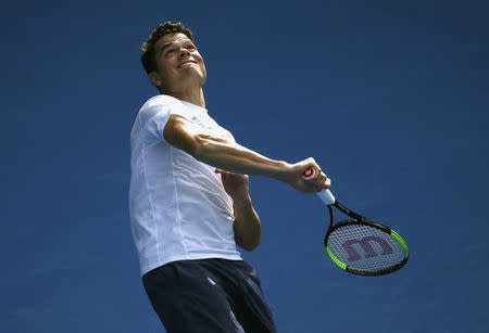 Canada's Milos Raonic hits a shot during a training session ahead of the Australian Open tennis tournament in Melbourne, Australia, January 14, 2017. REUTERS/Edgar Su