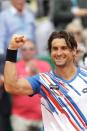 David Ferrer celebrates after winning his Monte-Carlo ATP Masters match against Rafael Nadal on April 18, 2014 in Monaco