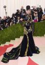 <p>Katy Perry took a risk at the 2016 MET Gala in this embellished black and gold Prada gown and it totally paid off.</p>