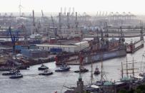 Tugboats perform a "ballet" during the celebrations of the 823rd anniversary of the establishment of the port of Hamburg.