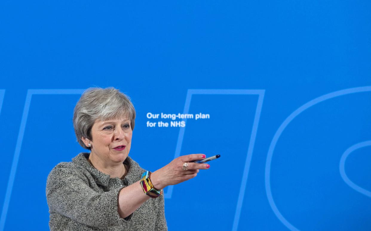 Britain's Prime Minister Theresa May makes a speech at the Royal Free Hospital in north London