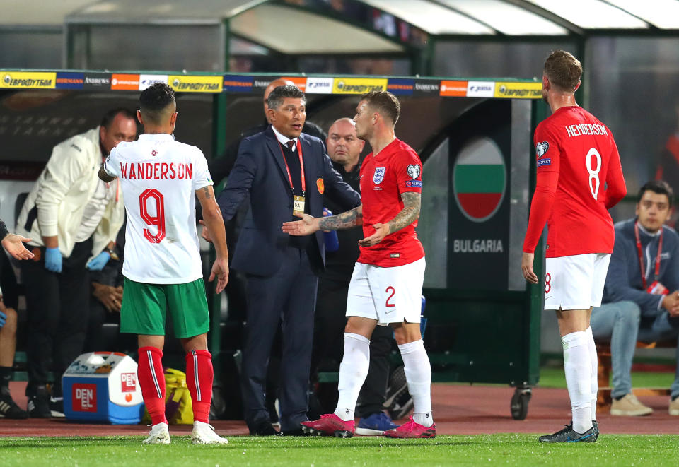 SOFIA, BULGARIA - OCTOBER 14: Krasimir Balakov, Manager of Bulgaria speaks with Kieran Trippier of England during the UEFA Euro 2020 qualifier between Bulgaria and England on October 14, 2019 in Sofia, Bulgaria. (Photo by Catherine Ivill/Getty Images)