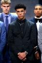 <p>Lonzo Ball poses on stage before the first round of the 2017 NBA Draft at Barclays Center on June 22, 2017 in New York City. </p>