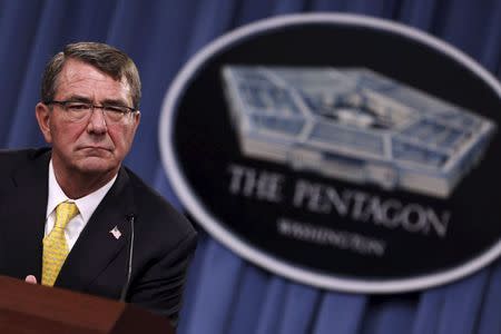 U.S. Defense Secretary Ash Carter listens to questions during a news conference at the Pentagon in Arlington, Virginia in this August 20, 2015 file photo. REUTERS/Jonathan Ernst