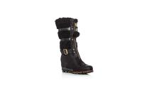 <p>We love the exposed front zipper and the matching buckle of these Sorel wedge boots that add a bit of a rock ‘n roll vibe to them. Pair them with dark jeans and a winter biker jacket for the ultimate cool girl look. Plus, the waterproof leather and shearling on the boots will keep you feet warm and comfortable.</p> <p>To buy: <a rel="nofollow noopener" href="http://click.linksynergy.com/fs-bin/click?id=93xLBvPhAeE&subid=0&offerid=465536.1&type=10&tmpid=2425&RD_PARM1=http%3A%2F%2Fwww1.bloomingdales.com%2Fshop%2Fproduct%2Fsorel-helen-holiday-shearling-wedge-boots%3FID%3D1890245%2526CategoryID%3D1000693&u1=TLFASsheG1SnowBootsDZ1" target="_blank" data-ylk="slk:bloomingdales.com;elm:context_link;itc:0;sec:content-canvas" class="link ">bloomingdales.com</a>, $295</p>