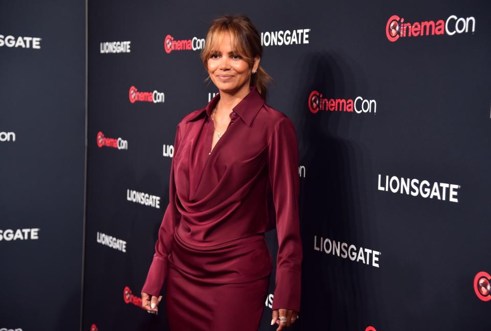 Halle Berry Plays With Plunging Silhouettes in Burgundy Top and ...