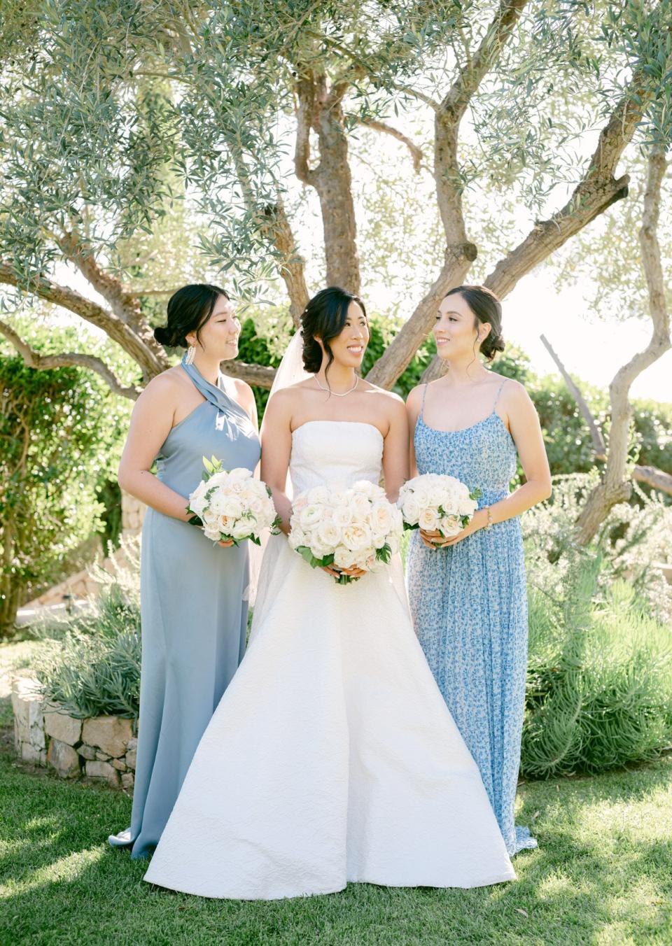 bride and bridesmaids in pastel blue