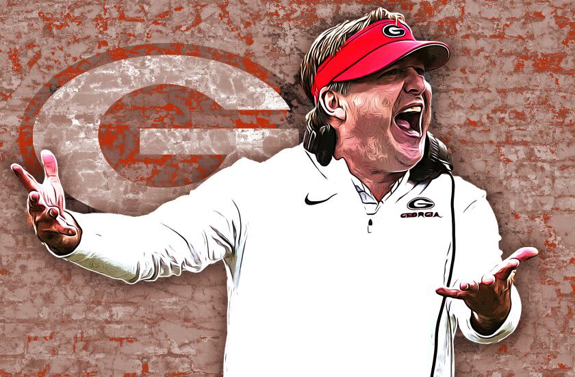 Georgia head coach Kirby Smart talks to an official during the second half of an NCAA college football game.