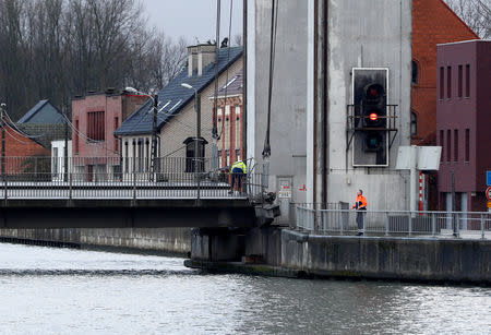 View of a Humbeek lift bridge, which was damaged when lowered onto a barge, blocking Brussels-Scheldt canal traffic, in Humbeek near Brussels, Belgium, January 17, 2019. REUTERS/Francois Lenoir
