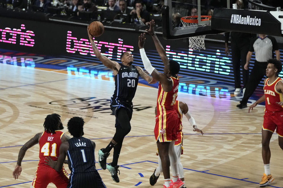 Orlando Magic's Markelle Fultz (20) goes up for a shot against the Atlanta Hawks during the first half of an NBA basketball game, at the Mexico Arena in Mexico City, Thursday, Nov. 9, 2023. (AP Photo/Eduardo Verdugo)