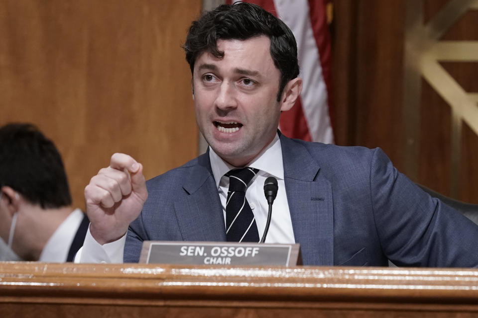 Chairman Jon Ossoff, D-Ga., questions Michael Carvajal, the outgoing director of the Federal Bureau of Prisons, as the Senate Permanent Subcommittee On Investigations holds a hearing on charges of corruption and misconduct at the U.S. Penitentiary in Atlanta, at the Capitol in Washington, Tuesday, July 26, 2022. (AP Photo/J. Scott Applewhite)