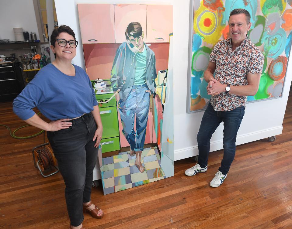 Signe Grushovenko, left, and Genna Grushovenko are artists in Greenville. Genna begins the team's art process by creating layers of pattern and tone for Signe to work with.  Next, Signe selects an image and draws with oil pastel on it.