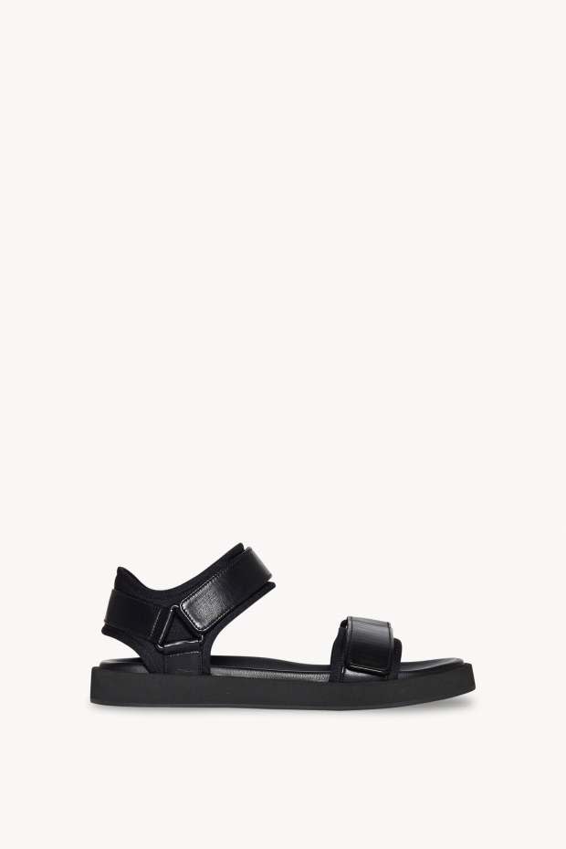 <p>The Row Hook-and-Loop Sandal, $1,070, <a href="https://www.therow.com/products/hook-and-loop-black-leather" rel="nofollow noopener" target="_blank" data-ylk="slk:available here;elm:context_link;itc:0;sec:content-canvas" class="link ">available here</a></p>