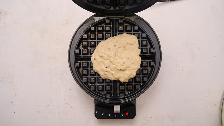 waffle batter on waffle iron