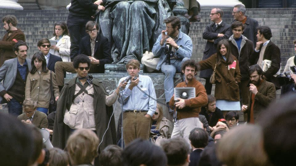 Activist Mark Rudd, center, president of Students for a Democratic Society, addresses students at Columbia University on May 3, 1968. - Hulton Archive/Getty Images
