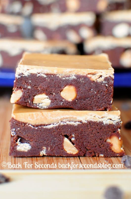 <p>Back For Seconds</p><p>These are the perfect no-bake treat for those of us who just can’t resist peanut butter and chocolate! </p><p><strong>Get the recipe: <a href="https://backforseconds.com/chocolate-peanut-butter-cookie-dough-bars/" rel="nofollow noopener" target="_blank" data-ylk="slk:Chocolate Peanut Butter Cookie Dough Bars;elm:context_link;itc:0;sec:content-canvas" class="link rapid-noclick-resp">Chocolate Peanut Butter Cookie Dough Bars</a></strong></p><p><strong>Related: <a href="https://parade.com/food/christmas-cupcakes" rel="nofollow noopener" target="_blank" data-ylk="slk:50 Festive Christmas Cupcakes;elm:context_link;itc:0;sec:content-canvas" class="link rapid-noclick-resp">50 Festive Christmas Cupcakes</a></strong></p>