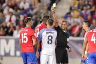 Sep 1, 2017; Harrison, NJ, USA; Referee John Pitti issues a yellow card to United States forward Clint Dempsey (8) during the second half against Costa Rica at Red Bull Arena. Vincent Carchietta-USA TODAY Sports