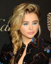 <p>Chloe Moretz opted for bold bright blue shadow all around her eyes for a graphic feel.</p>