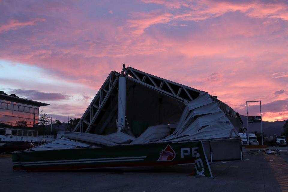 A general view of a damaged PEMEX gas station on a road after Hurricane Otis hit, near Acapulco (REUTERS)